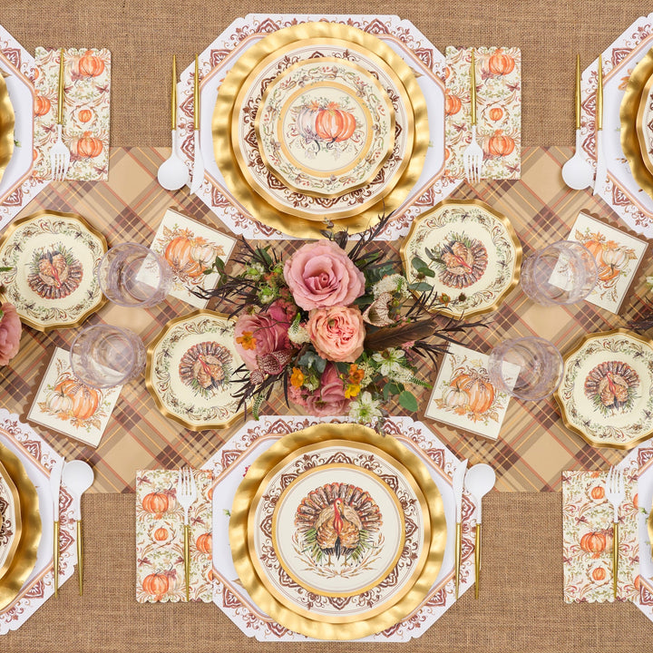 Sure! Here’s the revised sentence using your provided product data: Celebrate Thanksgiving in style with the Turkey & Gourds Table Setting by Sophistiplate, a fall-themed party-in-a-box that includes designer disposable plates adorned with turkeys and pumpkins, gold chargers, a floral centerpiece featuring pink roses, a plaid tablecloth, and matching napkins—all beautifully coordinated to create stunning Thanksgiving table decor when viewed from above.