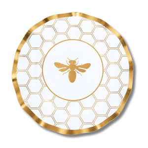 Bring a touch of elegance to any occasion with the Sophistiplate Honeybee White Wavy Paper Dinner Plates (8pk). Featuring a round white design with a gold honeycomb pattern, a gold bee at the center, and an elegantly accented gold rim, these disposable plates are among the most stylish choices for your celebration.