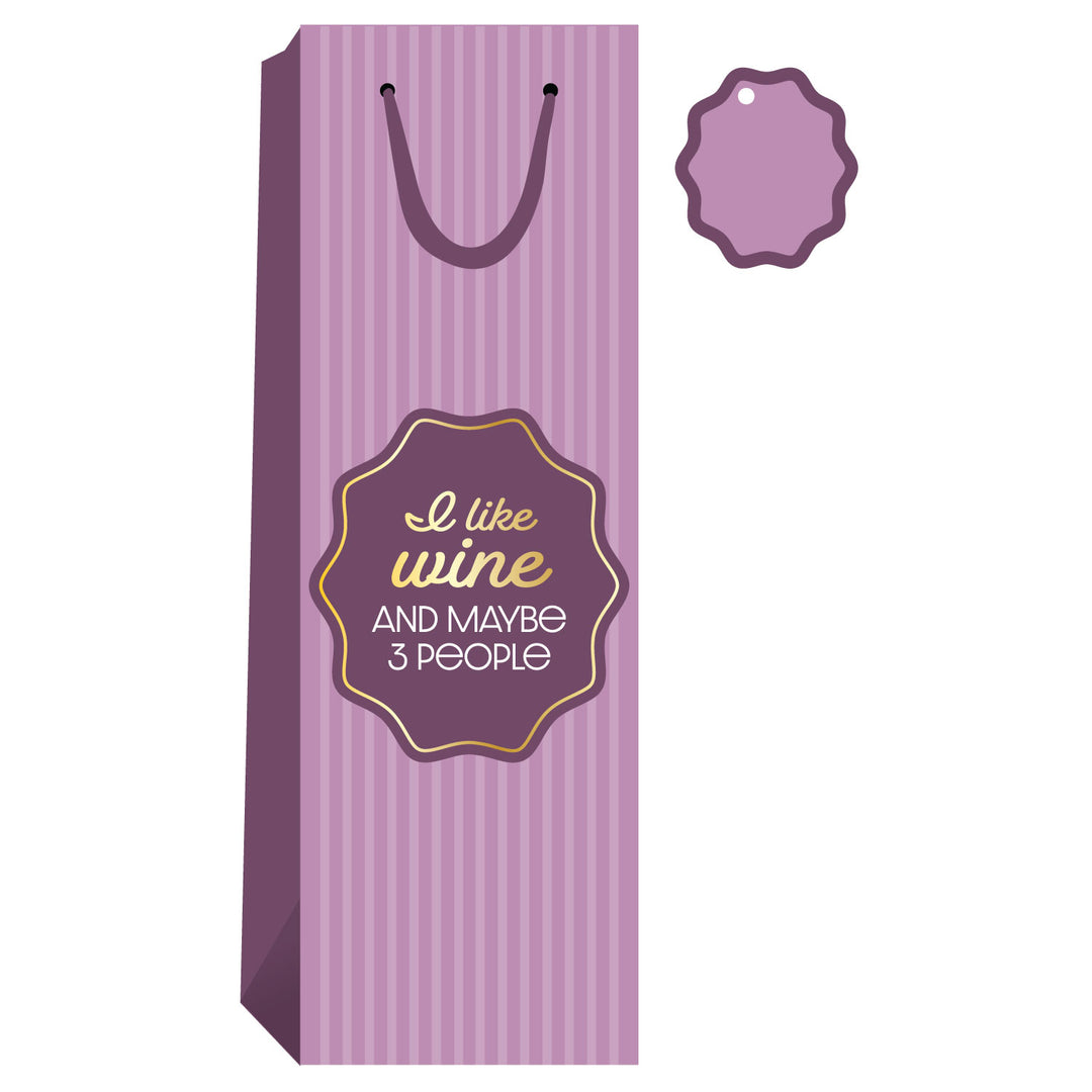 The Drinks On Me “I Like Wine” wine bag is tall with pink-purple stripes, a dark handle, and a funny gold and white label. Includes a matching blank gift tag—perfect hostess gift!.