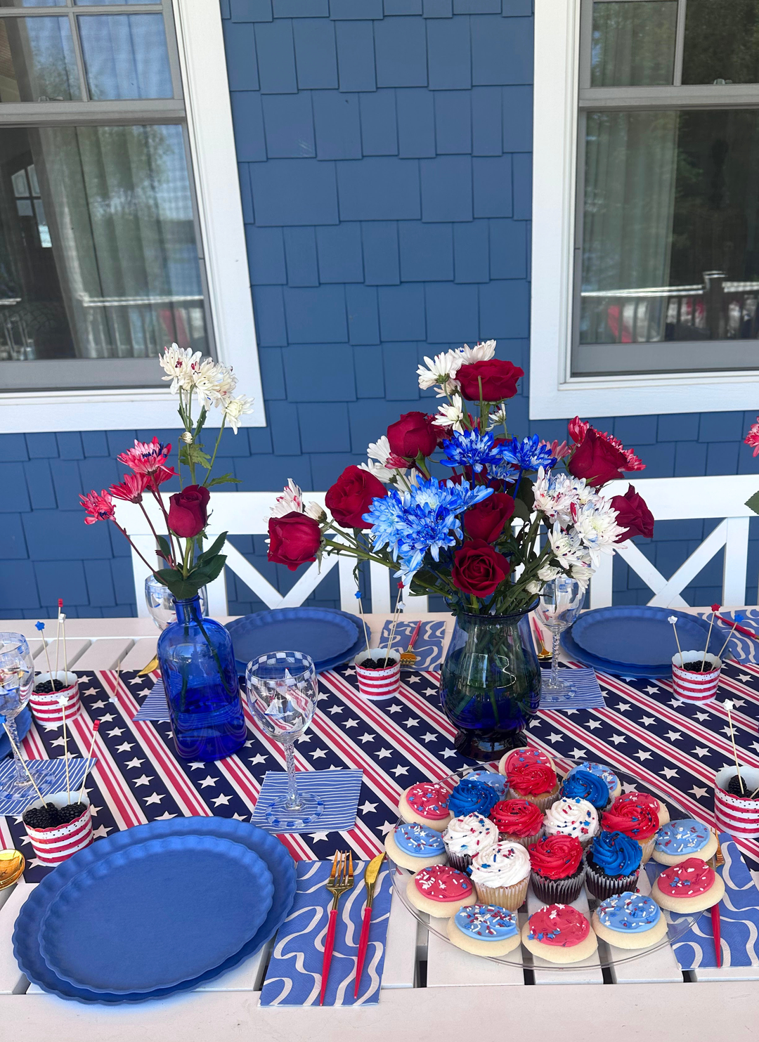 Create a festive, eco-friendly 4th of July celebration with Sophistiplate LLC's "4th of July Table for 16+: French Blue"—includes compostable bamboo plates, patriotic star napkins, and red, white & blue décor for a stylish party setup.
