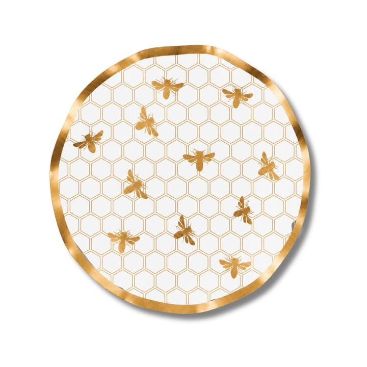 The Sophistiplate Honeybee Wavy Paper Salad Plate (8pk) features a charming honeycomb pattern with gold bees on a crisp white background, elegantly bordered by a gold rim and finished with a delicate ruffled edge, making it the perfect choice to showcase an enchanting honeybee design at your next gathering.