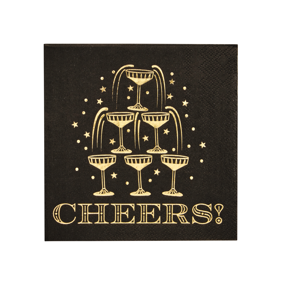 Midnight Sparkle Paper Cocktail Napkin Cheers/26pk, featuring a black square cocktail napkin with a gold foil illustration of a champagne tower and the word CHEERS! written underneath.