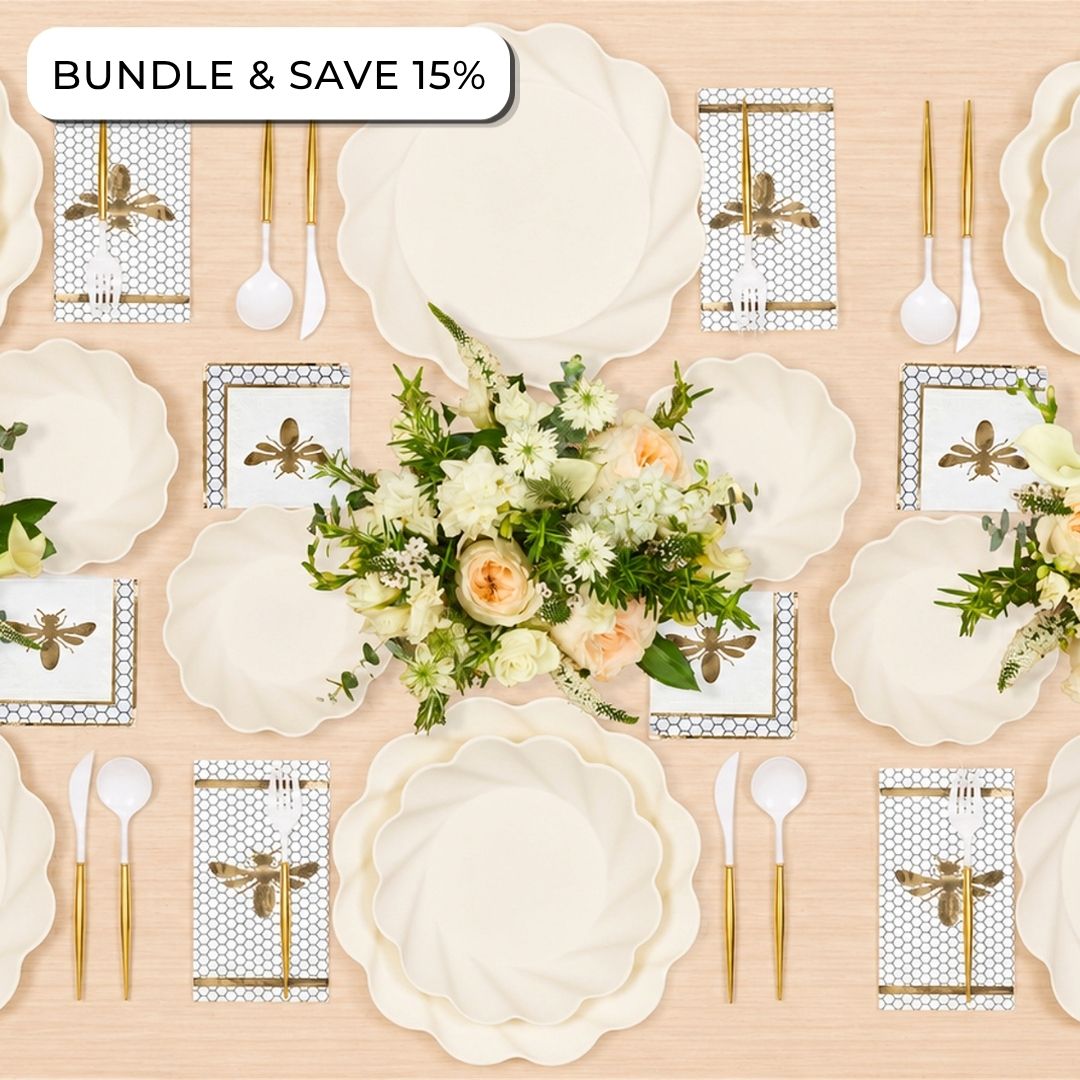 Elevate your table setting with the Sophistiplate LLC Rosh Tablescape for 16 Guests: Eco Cream Honeybee, featuring cream-colored scalloped plates, gold cutlery, floral centerpieces, and decorative napkins. This beautiful Rosh Hashanah tableware set includes stylish disposable party plates designed for both convenience and sophistication. Text in the corner reads BUNDLE & SAVE 15%.