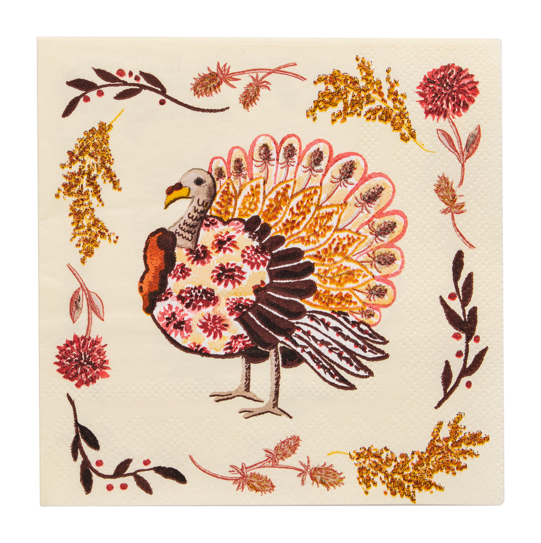 Add a festive touch to your Thanksgiving table or fall party with Sophistiplate’s Amber Harvest Cocktail Napkins. This 26-pack features a decorative design of a colorful turkey surrounded by autumn leaves and flowers in vibrant red, yellow, and orange tones on a cream background.