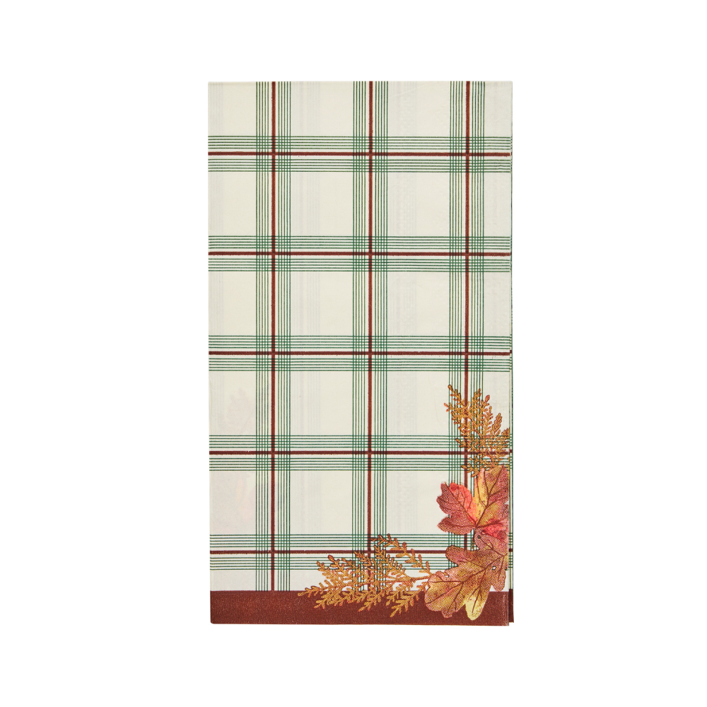 Woodland Harvest Guest Towels/20pk featuring a folded paper towel with a cream, green, and maroon plaid pattern and a cluster of autumn leaves in one corner, perfect for fall bathroom decor.
