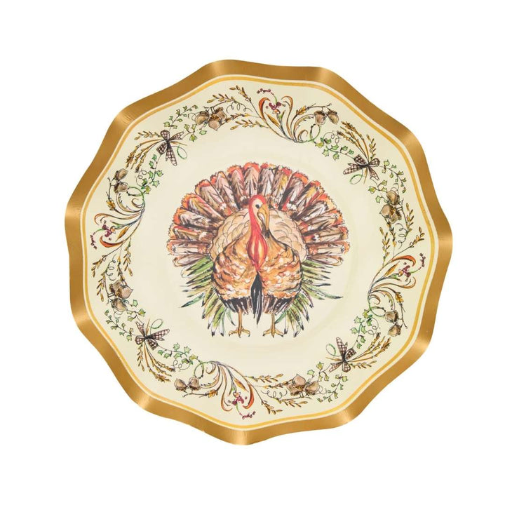 A decorative plate with a scalloped gold edge features a painted turkey in the center, surrounded by an ornate border of acorns, leaves, and scroll designs—perfect for pairing with Sophistiplate’s Turkey & Gourds Appetizer/Dessert Bowls (8-pack) to create an elegant holiday table setting.