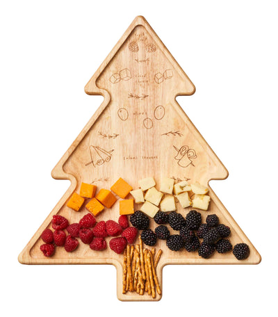 The Maple Meg Quinn CharcuteTree Charcuterie Board (18x15.33") features holiday engravings and displays raspberries, cheddar and white cheese cubes, blackberries, and pretzel sticks in festive rows on a white background.