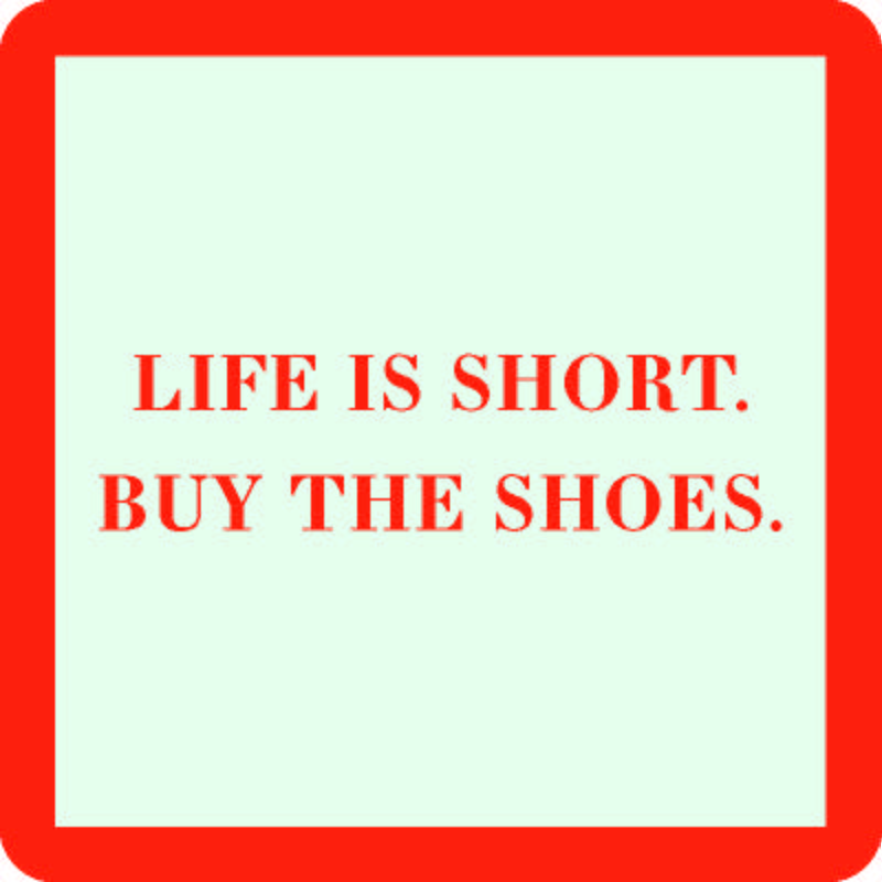 The Buy the Shoes Coaster by Drinks On Me features "LIFE IS SHORT. BUY THE SHOES." in bold red on a white square with a thick red border—making it a funny drink coaster and clever housewarming gift.