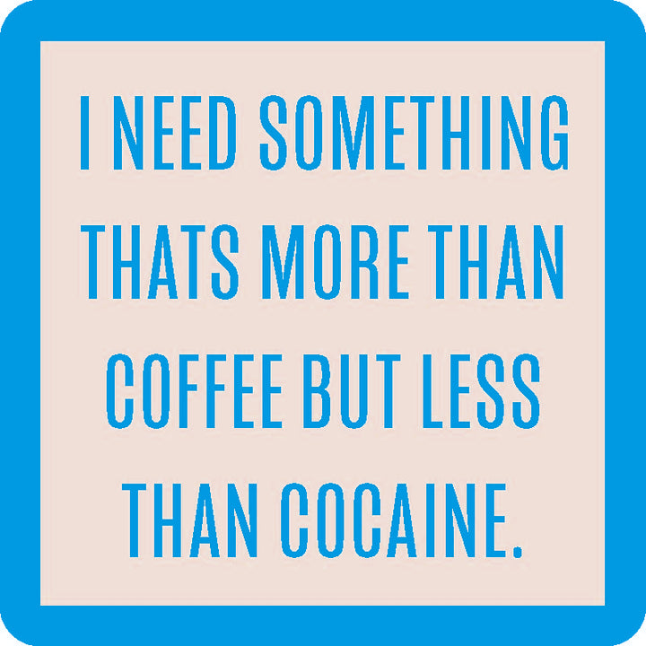 The More Than Coffee Coaster by Drinks On Me features a turquoise border, beige background, and centered turquoise text: I need something that’s more than coffee but less than cocaine—a funny and unique bar cart accessory.