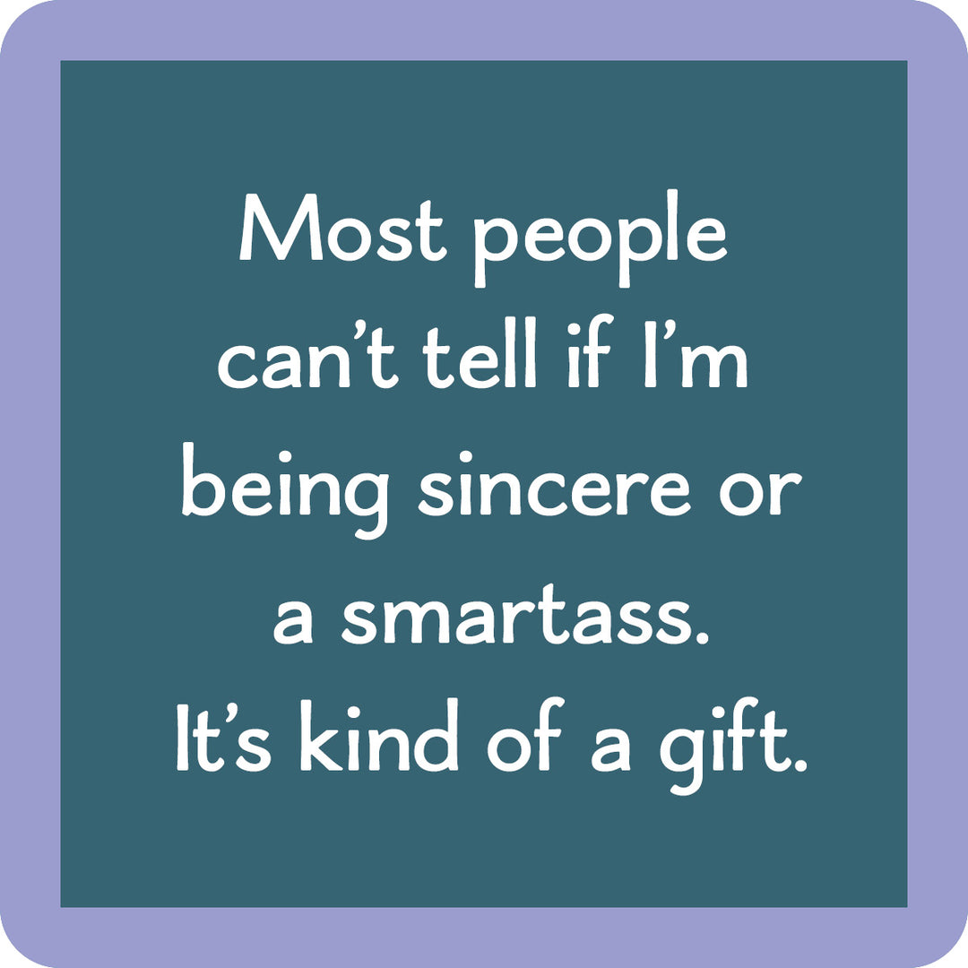 Text graphic with teal background and lavender border. The Smartass Coaster by Drinks On Me reads: Most people can’t tell if I’m being sincere or a smartass. A funny drink coaster for bar cart accessories or quirky gifts.
