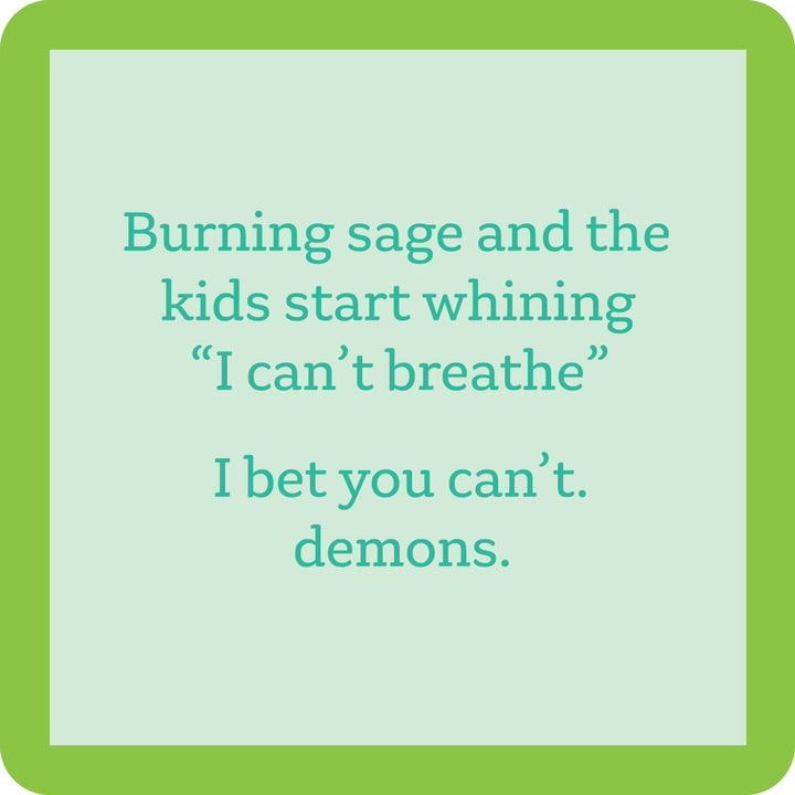 The Burning Sage Coaster by Drinks On Me features a green border, pale blue center, and the funny quote: "Burning sage and the kids start whining I can’t breathe. I bet you can’t. demons." A quirky drink coaster and housewarming gift.