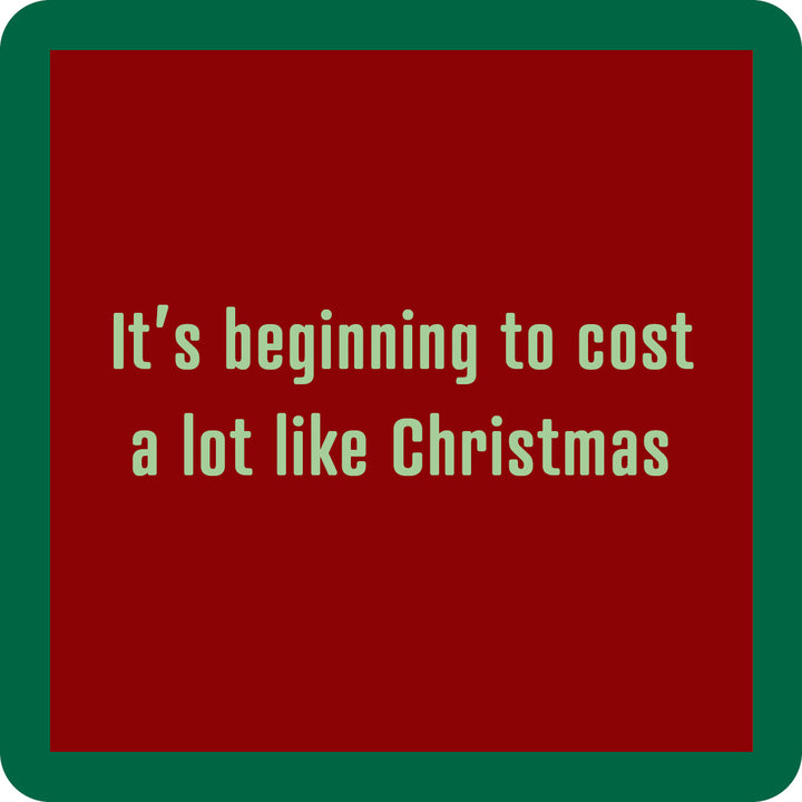 The Cost a Lot Coaster by Drinks On Me has a red square design with a green border and light green text: "Its beginning to cost a lot like Christmas"—a funny drink coaster or bar cart accessory.