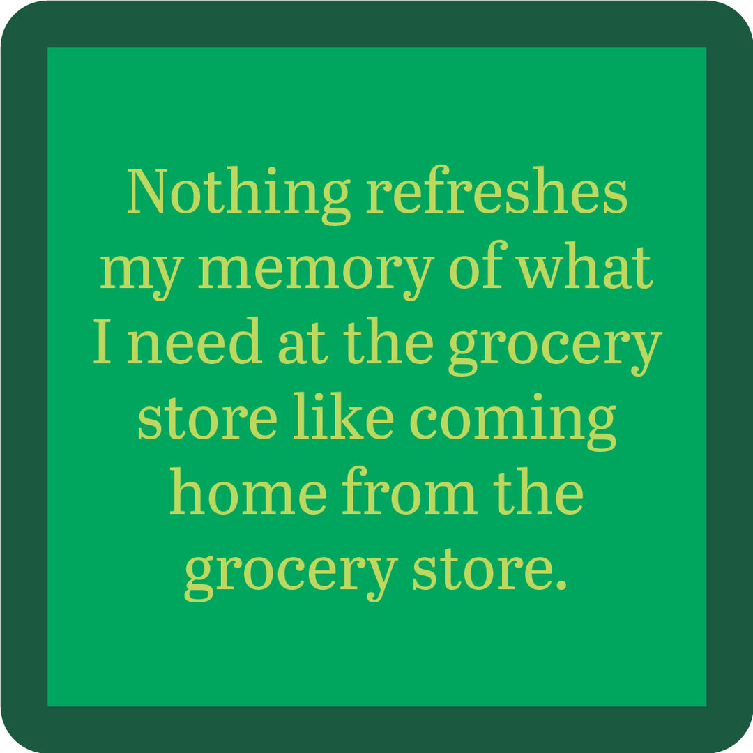 The Drinks On Me Grocery Store Coaster features a green square design with a dark green rounded border and tan text: “Nothing refreshes my memory of what I need at the grocery store like coming home from the grocery store.” Funny bar cart accessory!.