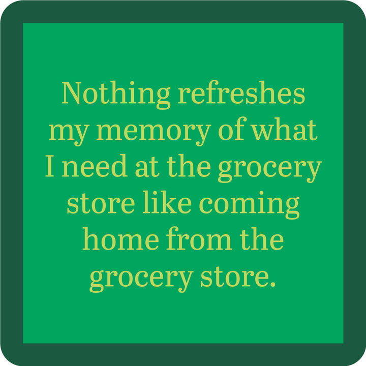 The Drinks On Me Grocery Store Coaster features a green square design with a dark green rounded border and tan text: “Nothing refreshes my memory of what I need at the grocery store like coming home from the grocery store.” Funny bar cart accessory!.