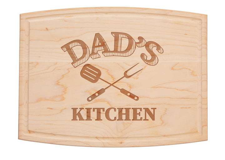 The Maple Arched Artisan Maple Board | Dad's Kitchen | 12 x 9" features “DADS KITCHEN” and crossed spatula and grilling fork—ideal as a cheese or charcuterie board for dad’s favorite snacks.