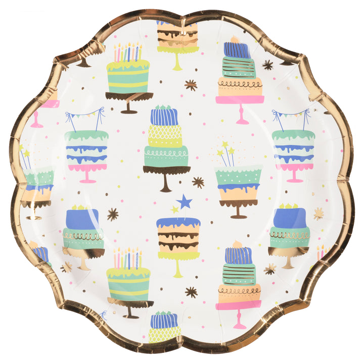 The Sophistiplate Salad Plate Birthday Candles/8ct features scalloped edges, gold rims, and colorful cake, candle, and confetti designs on white—perfect festive plates for birthday celebrations.